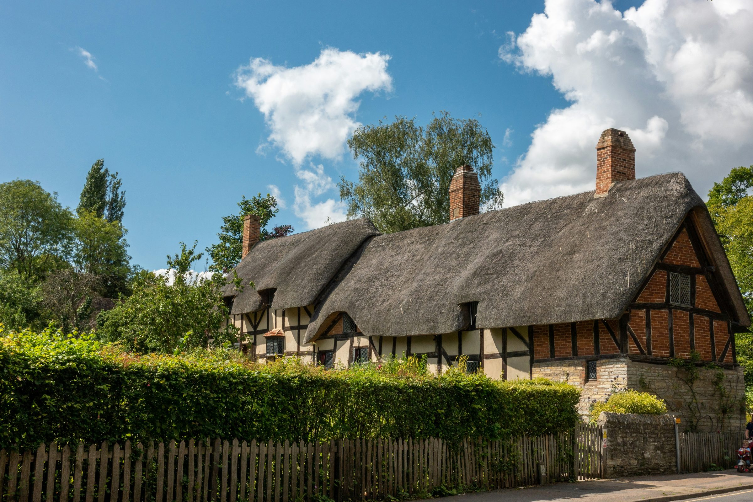The thatched roof and timber framing of Anne Hathaway's Cottage near Stratford-upon-Avon
