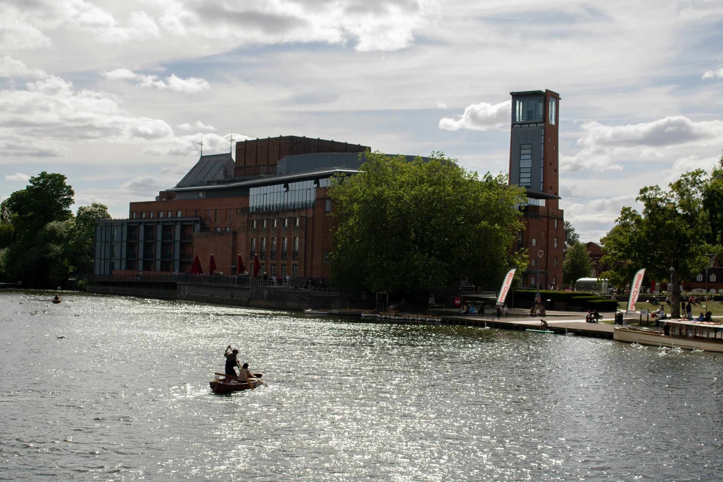 The Royal Shakespeare Theatre on the River Avon at Stratford, a punt on the water