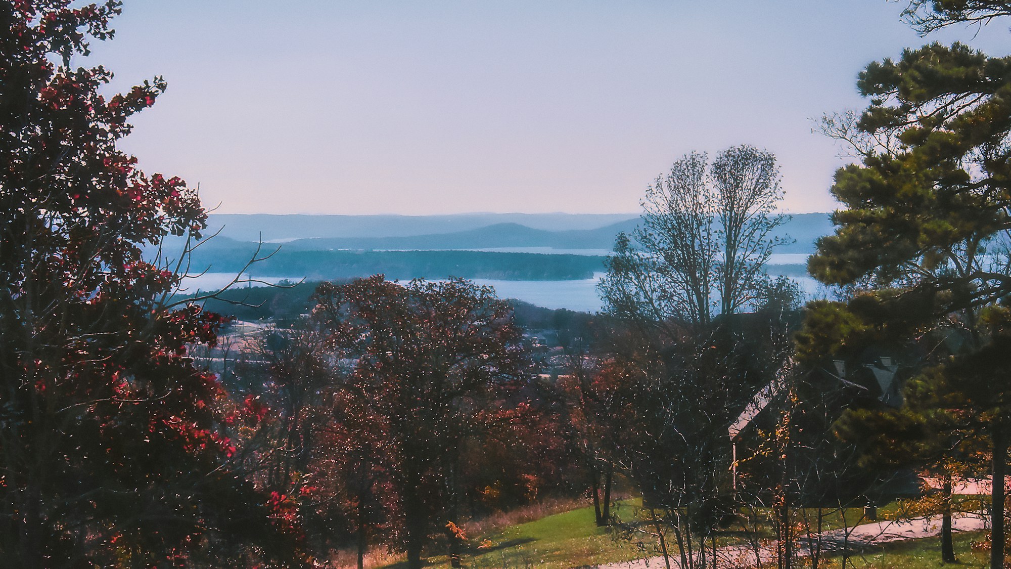 Autumn color above an Ozark lake from a hillside overlook.