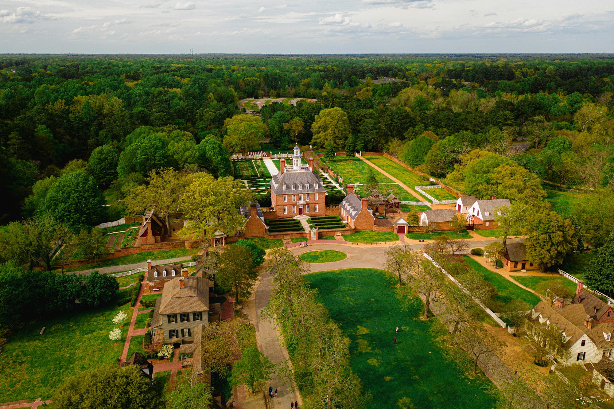 The Governor's Palace and its formal gardens at Colonial Williamsburg from the air.