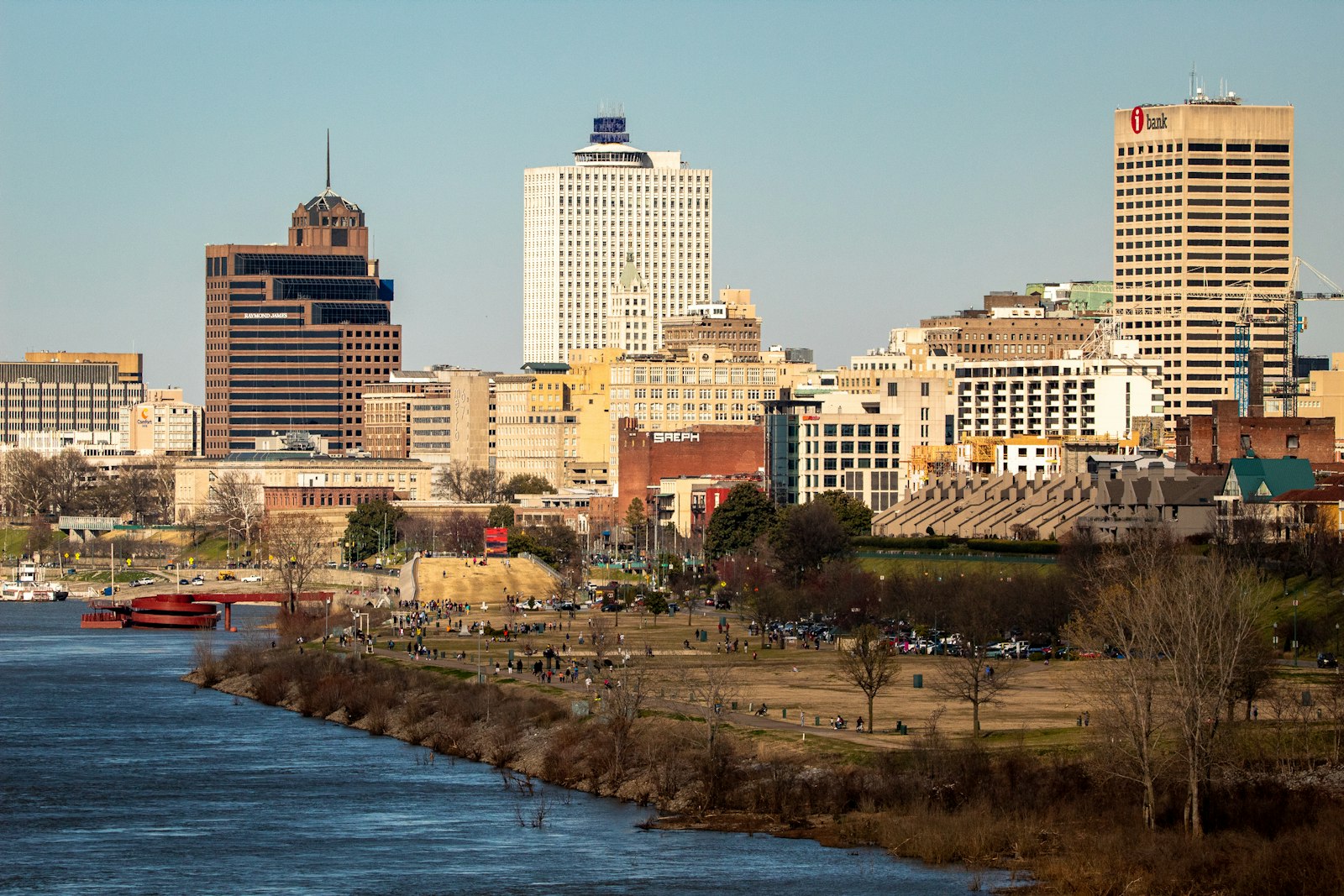 Downtown Memphis seen across the Mississippi River, with Tom Lee Park along the waterfront.