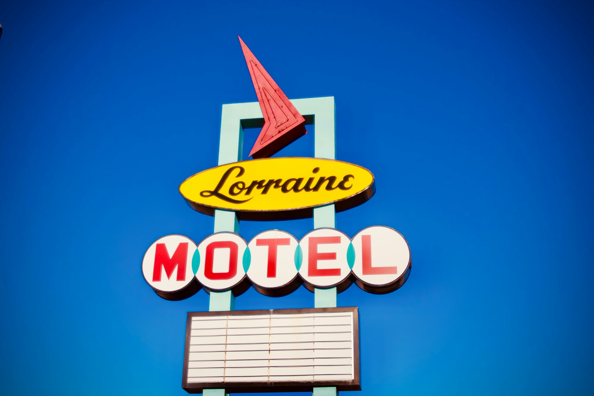 The Lorraine Motel sign against a clear sky in Memphis.