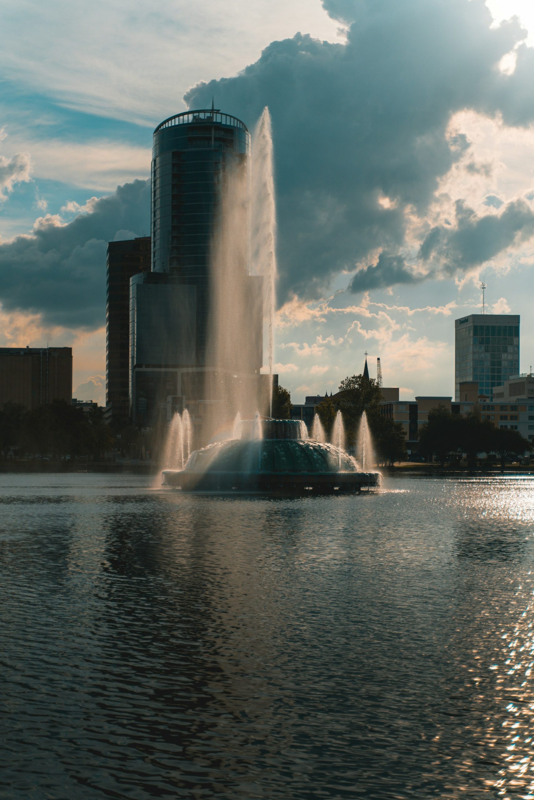 The fountain on Lake Eola with the Orlando skyline behind it.