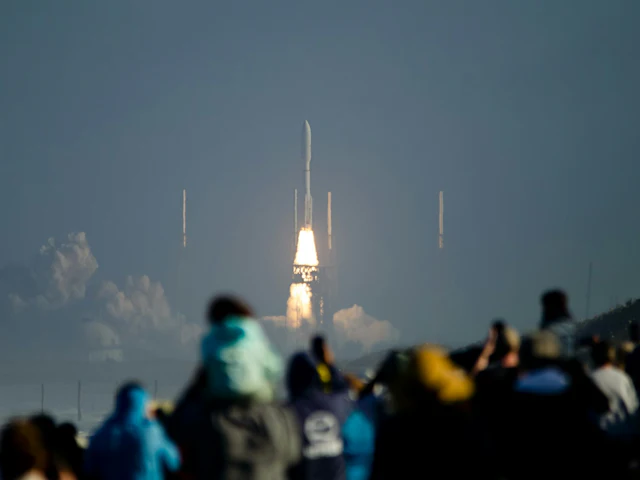 A crowd watching a rocket launch from the Space Coast.