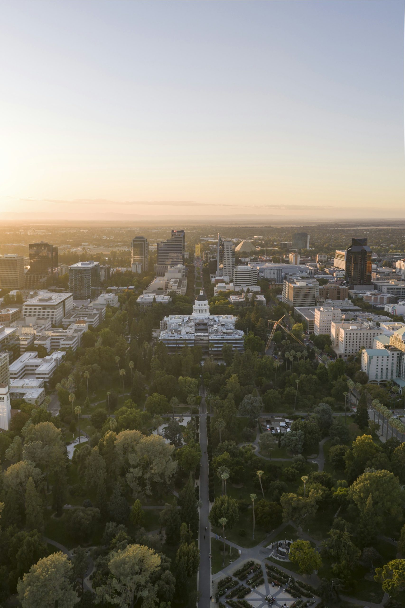 Sacramento’s tree-lined civic center and downtown streets from above.