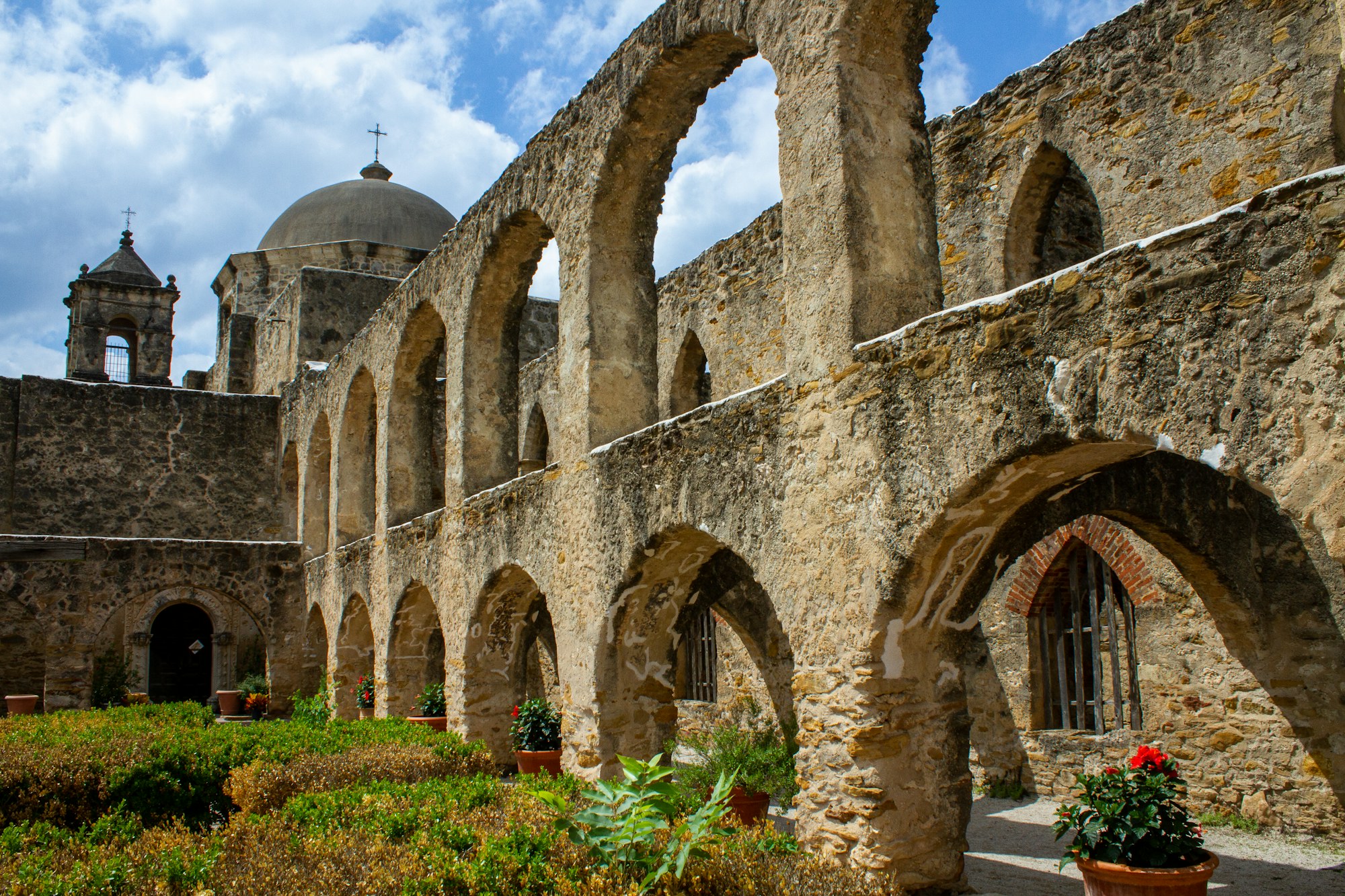 The arcaded convento walkway at Mission San José in San Antonio.