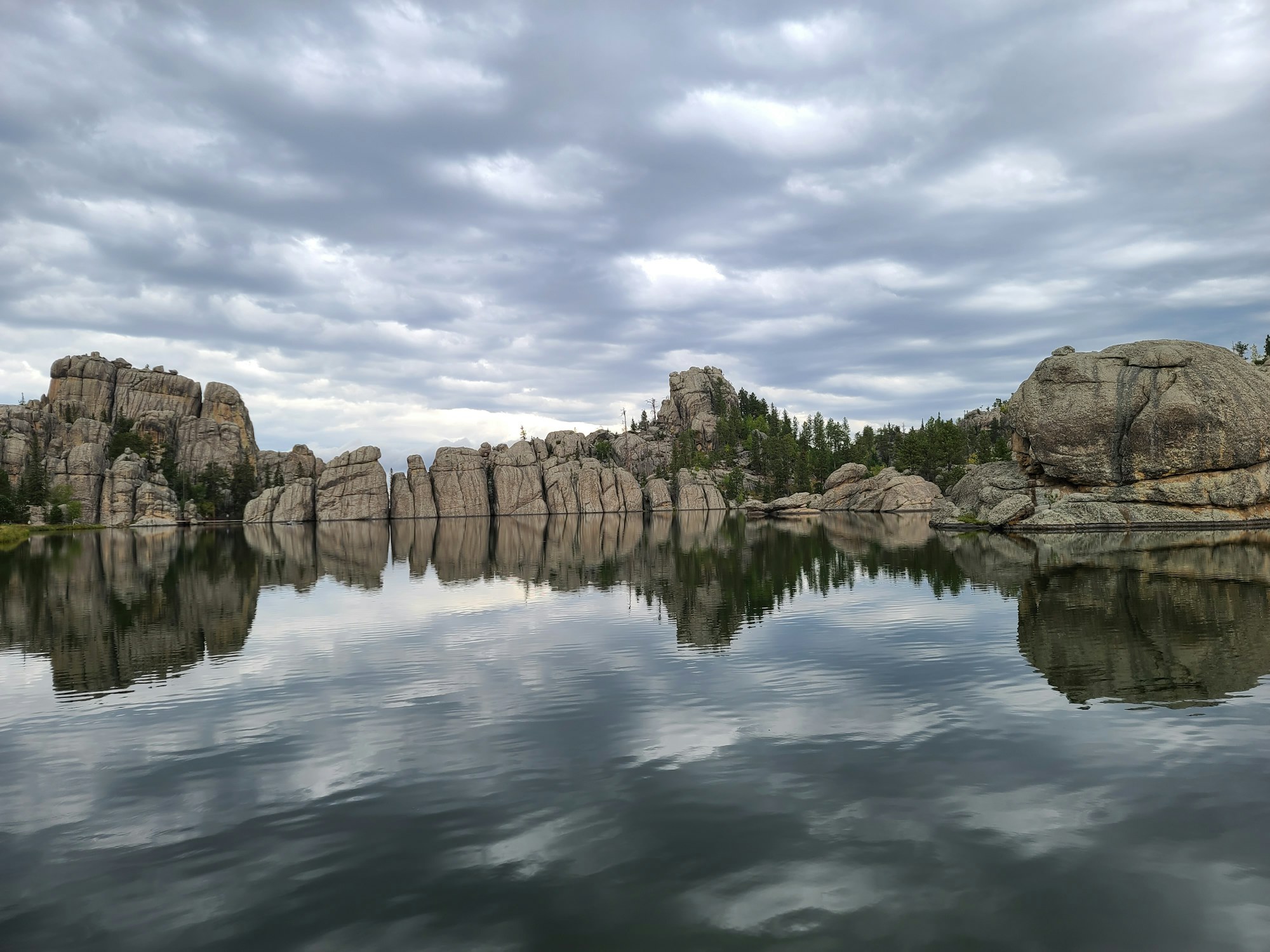 Granite spires reflected in Sylvan Lake, Custer State Park.
