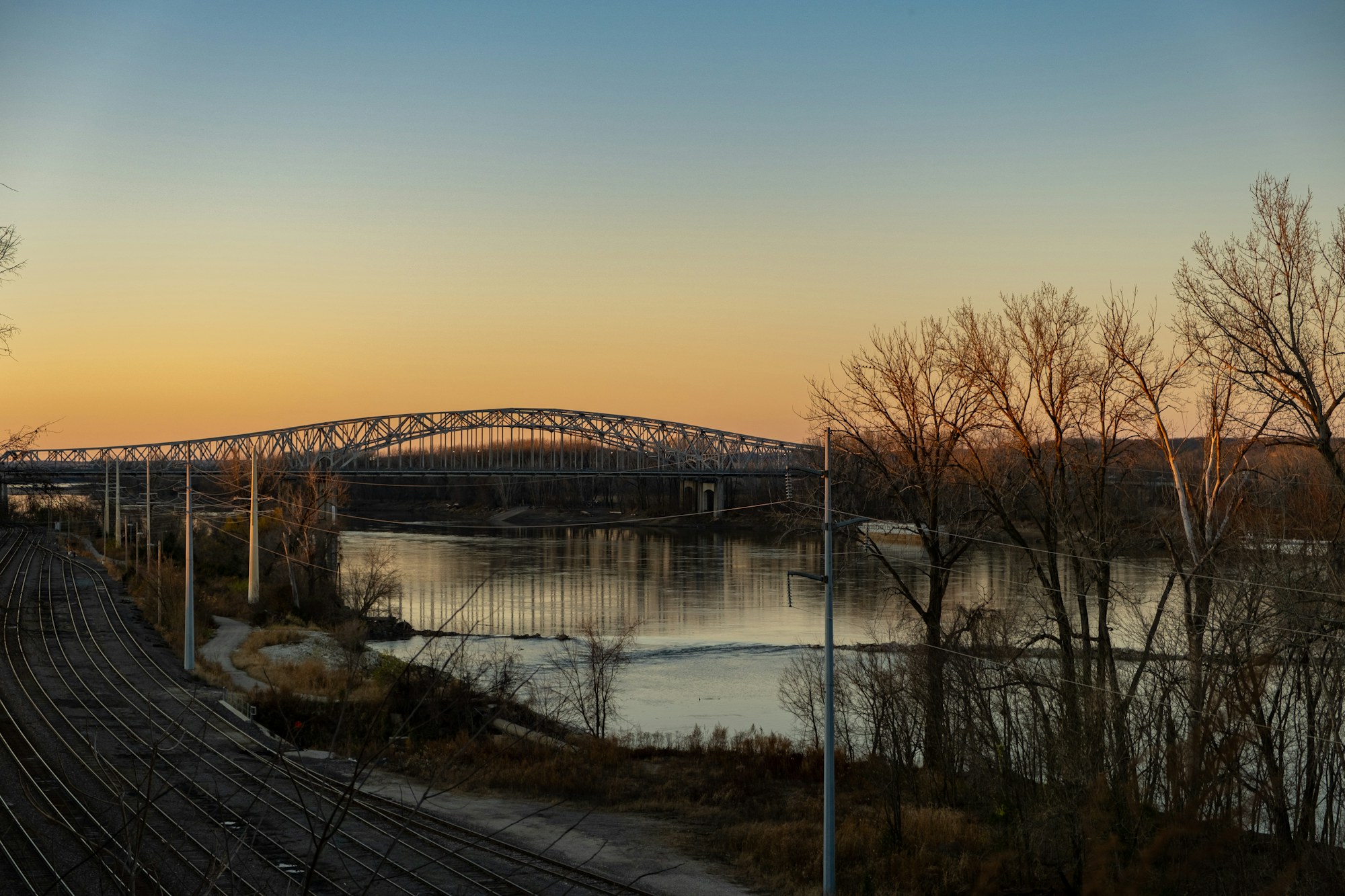 A bridge across the Missouri River in winter.