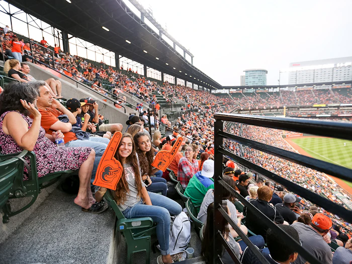 Students at Camden Yards in Baltimore, included only when the chosen route and home schedule allow.