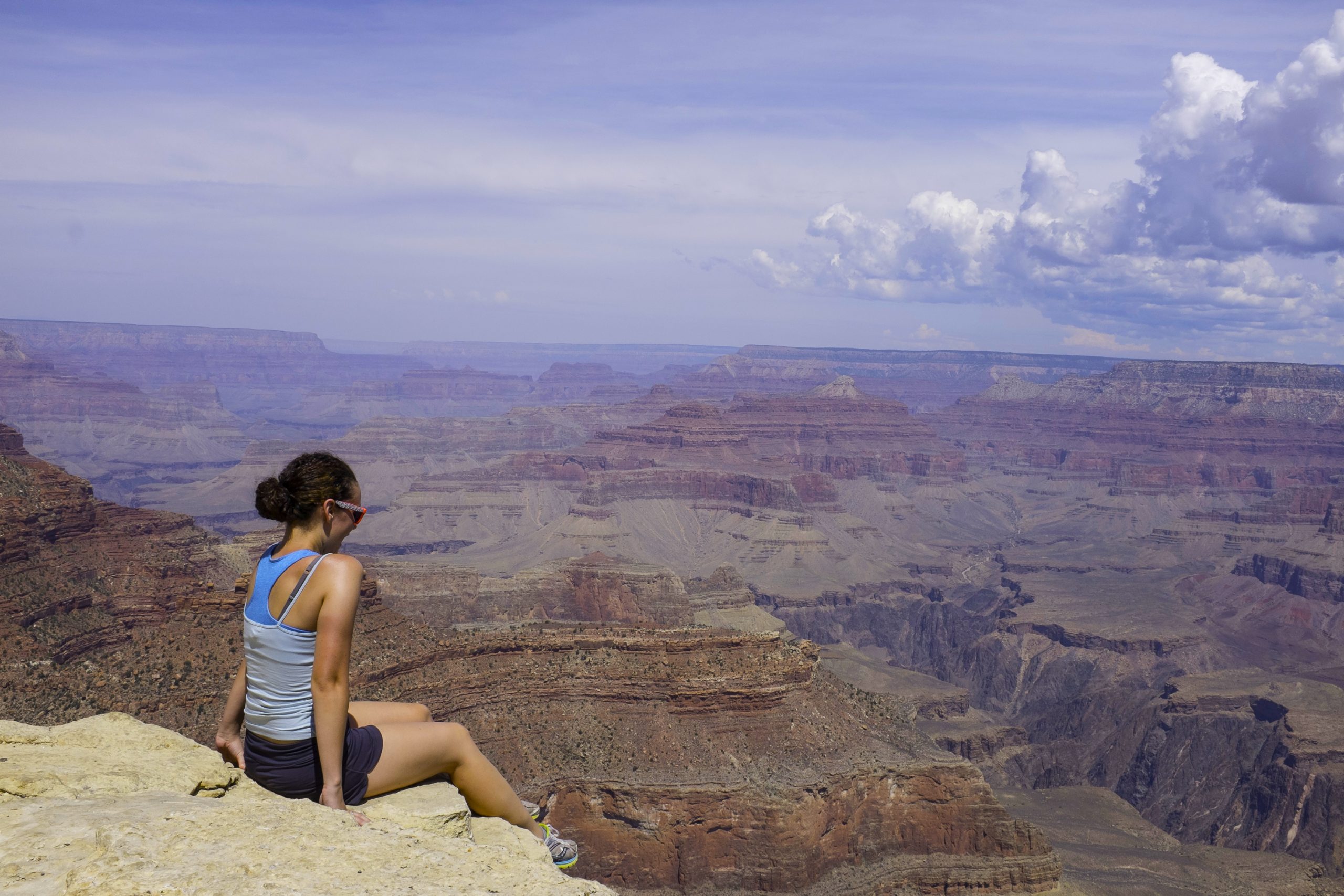 A student looks across the Grand Canyon’s layered rock walls.