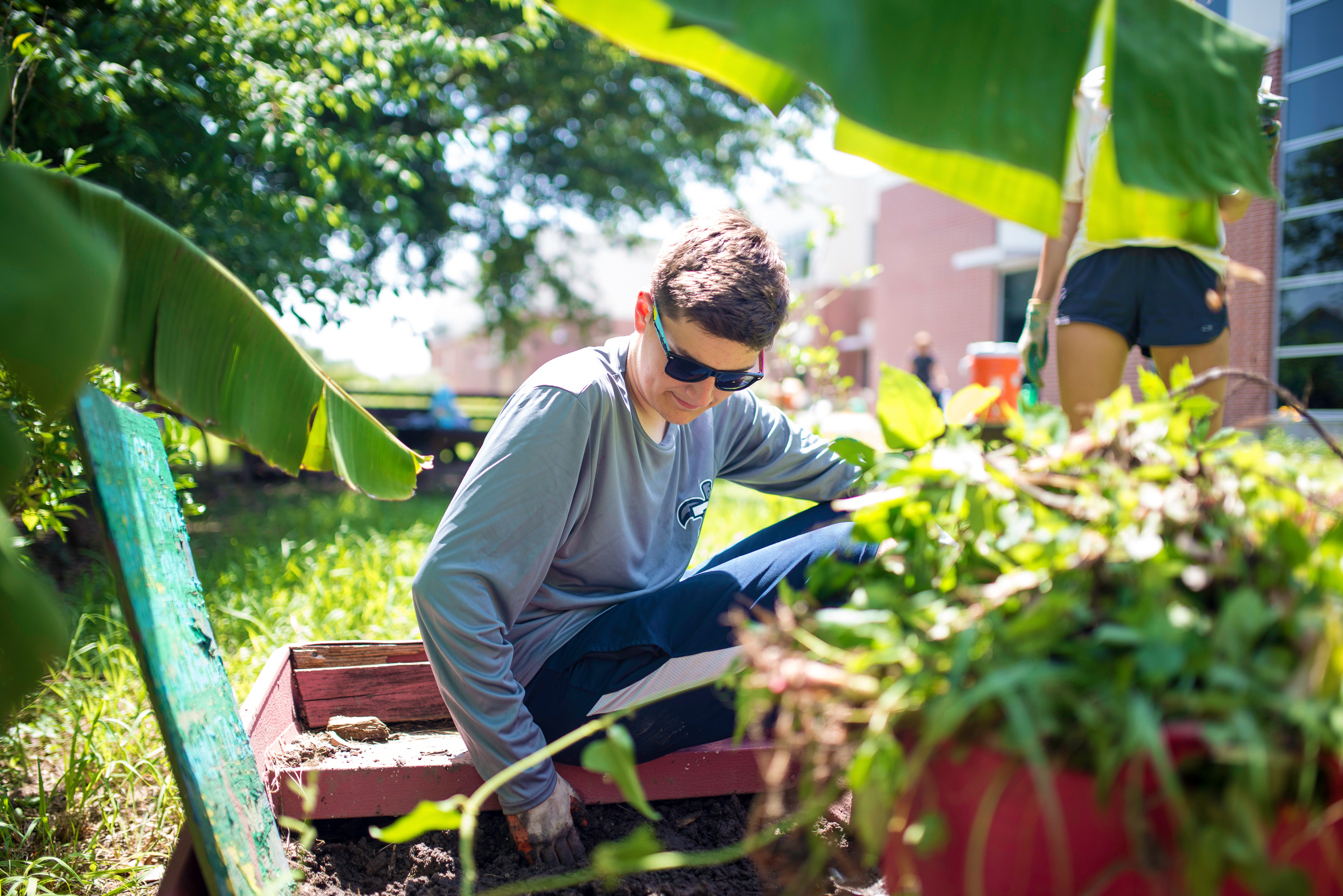 Student working in a garden in New Orleans.