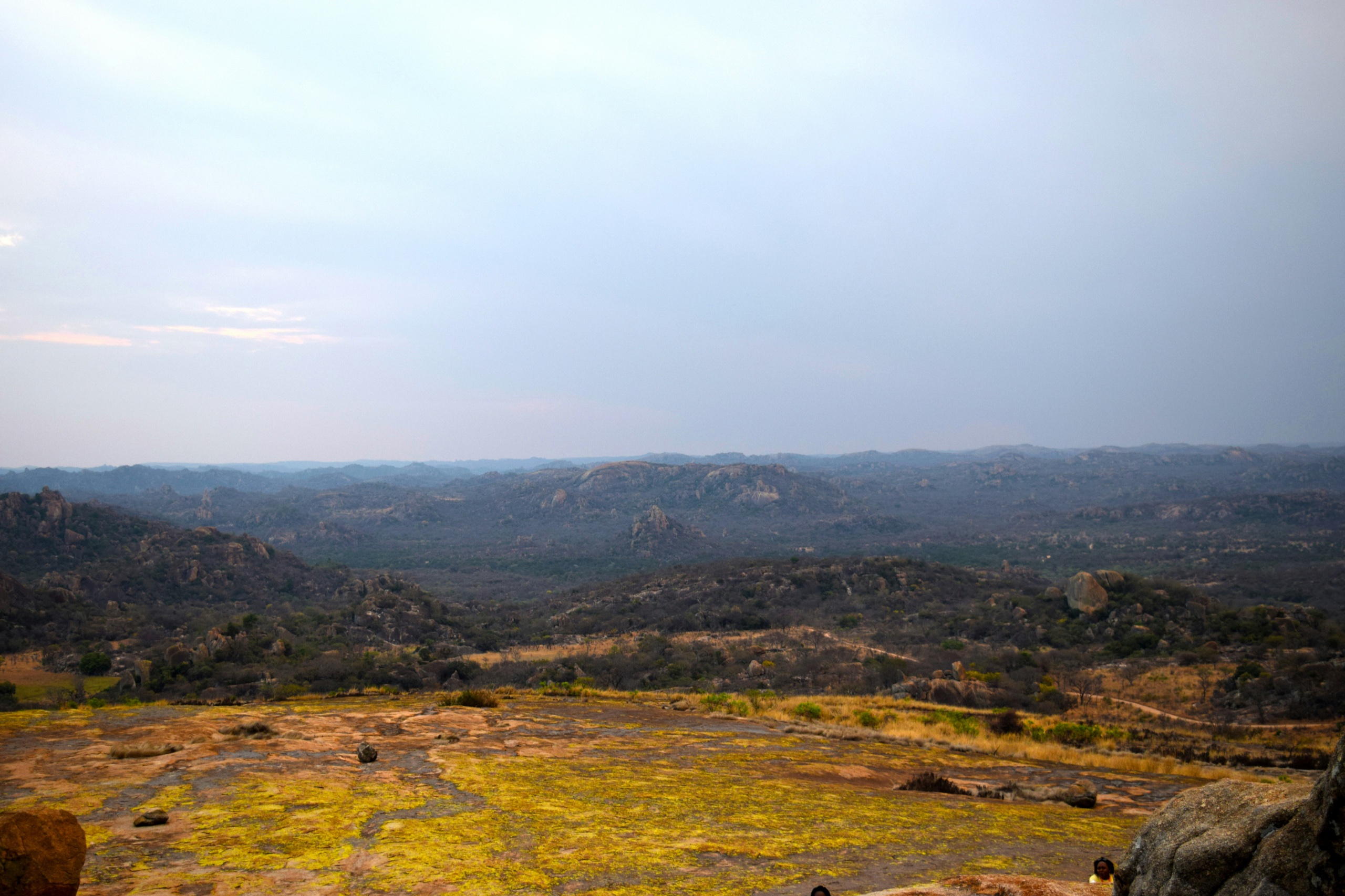 Granite kopjes and wooded valleys stretch to the horizon in the Matobo Hills of Zimbabwe