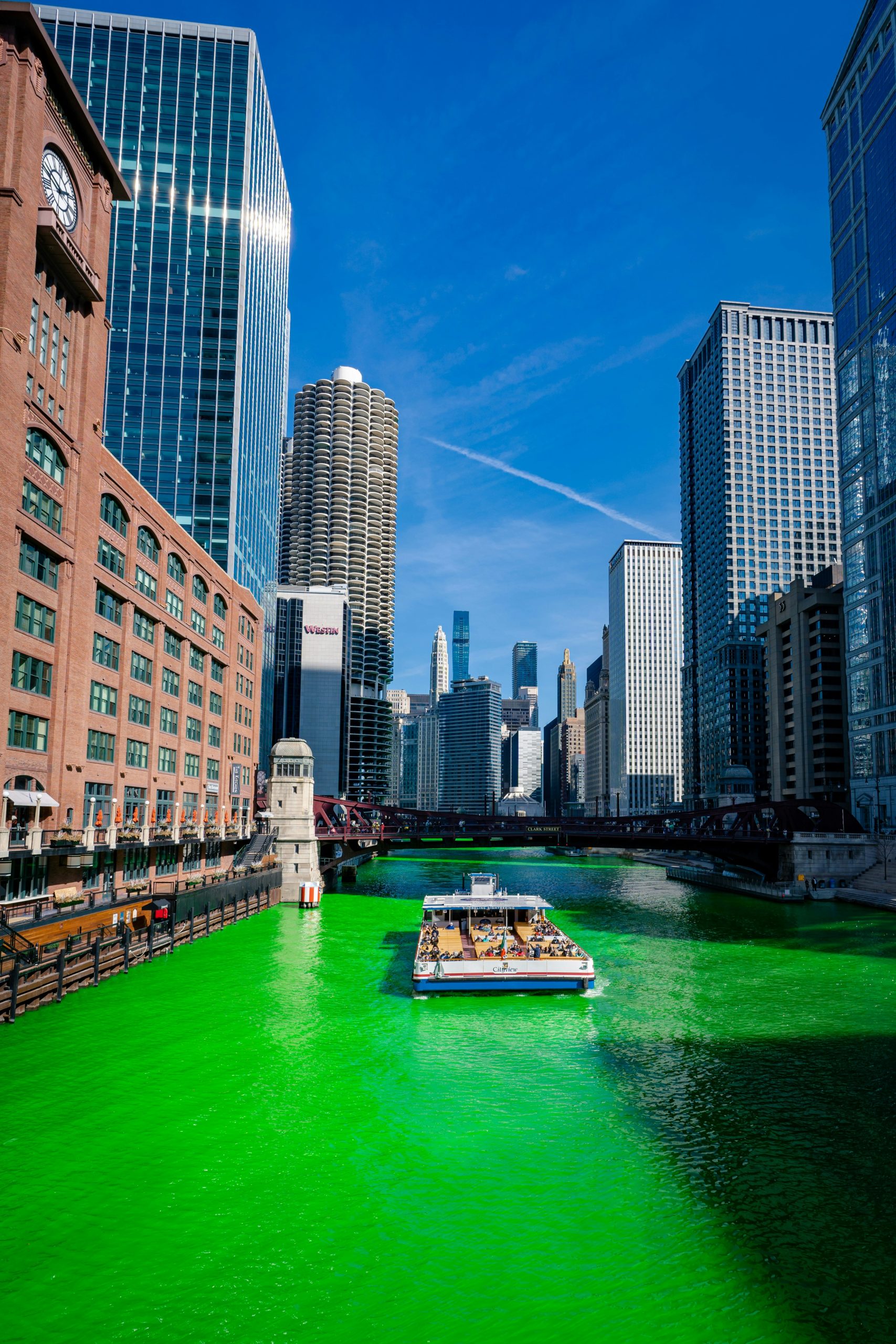 The Chicago River dyed green for St Patrick's Day, seen from the riverwalk.