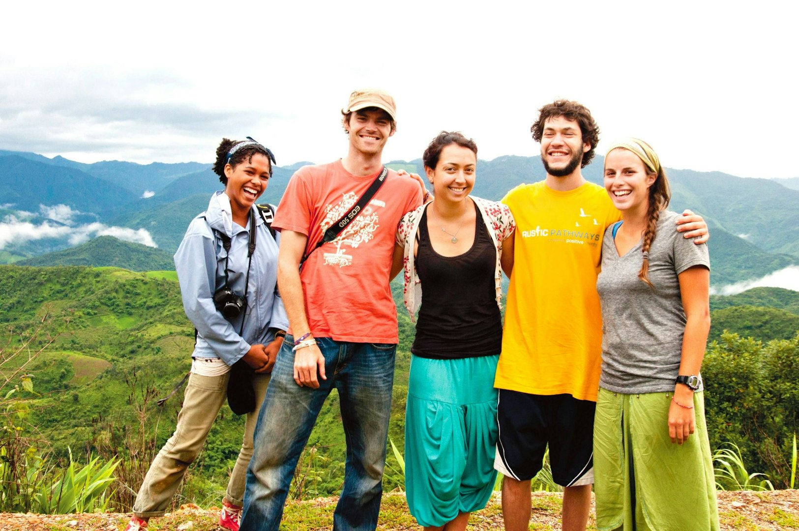 Group of international friends on a scenic hike during their gap year abroad.
