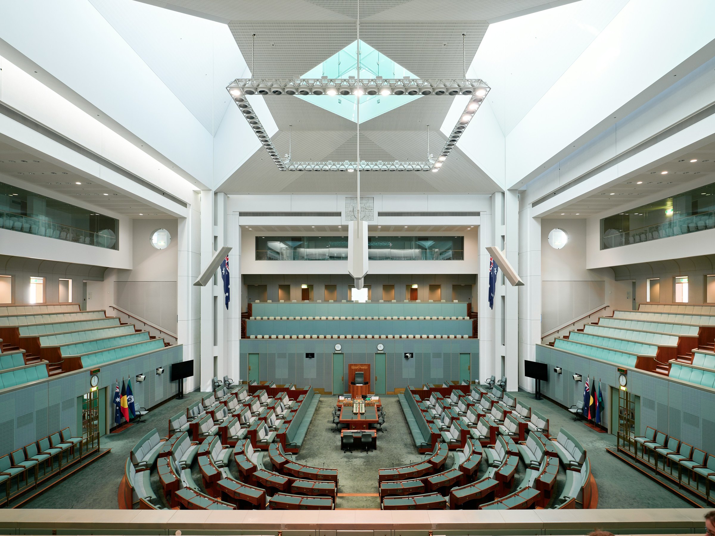 The green benches of the House of Representatives chamber at Parliament House