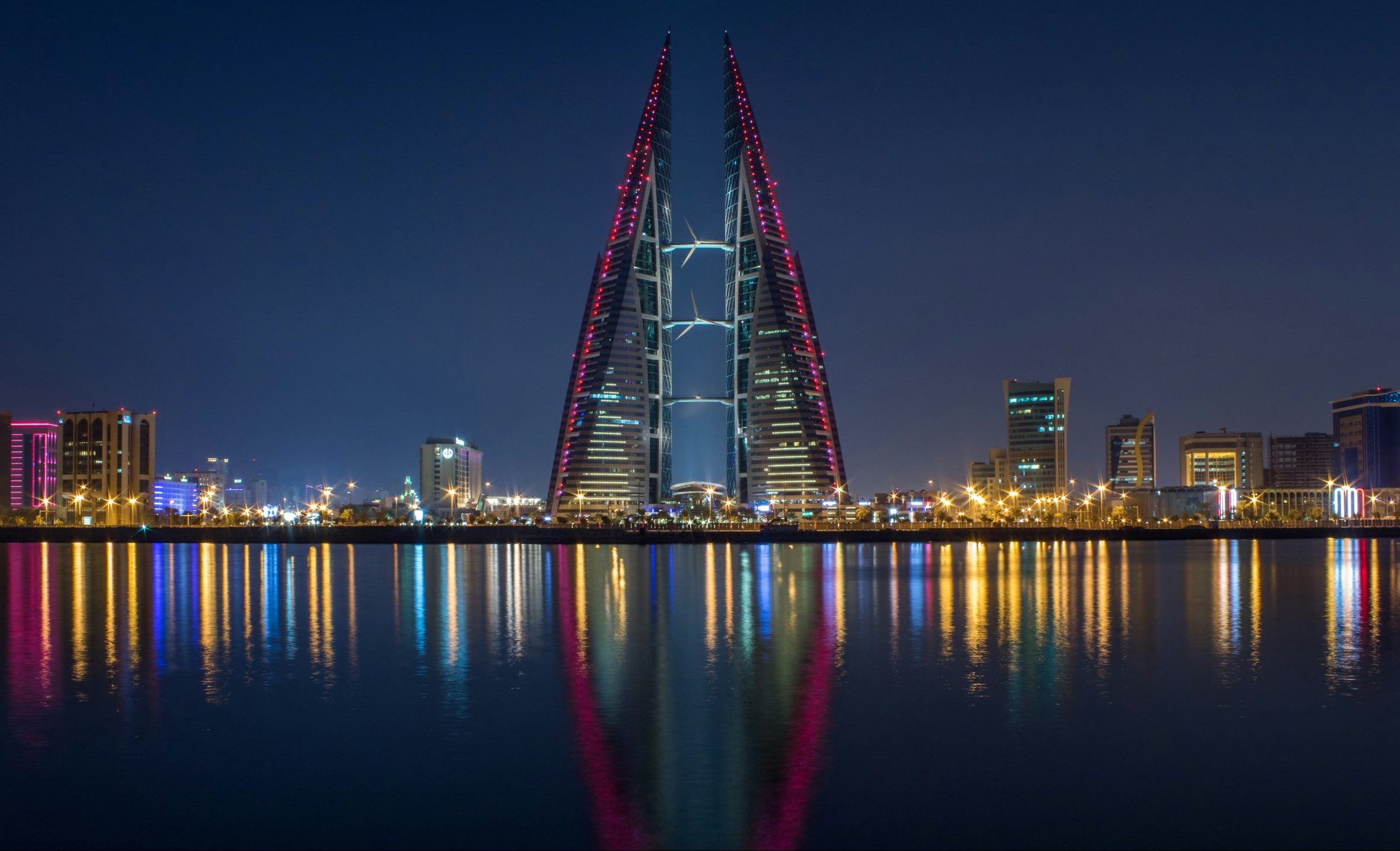 A nightscape of Bahrain from across a body of water. Learn more fun facts about Bahrain.