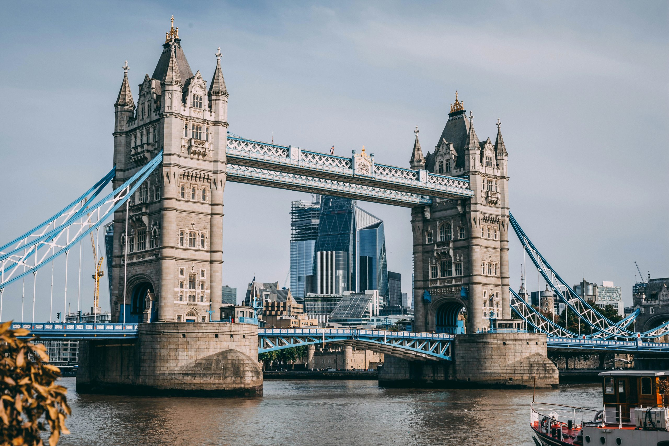 Buildings can be seen across the River Thames, framed by Tower Bridge.