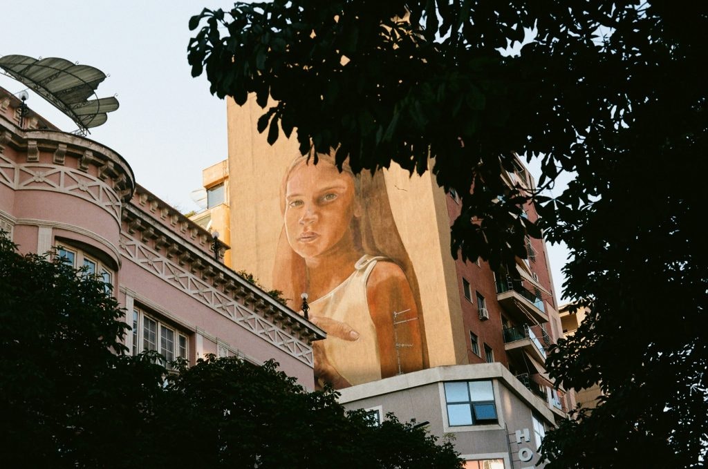 A portrait of a girl on a wall in Tirana, Albania.