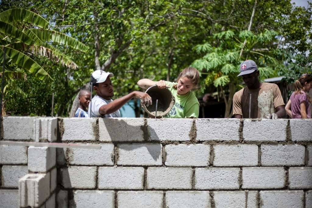 Community members and students working on a service project in the Dominican Republic
