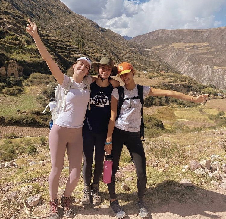 Students hiking in the mountains during a Rustic Pathways Peru teen tour.