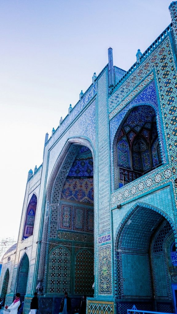 A beautifully tiled mosque with intricate blue mosaic patterns.