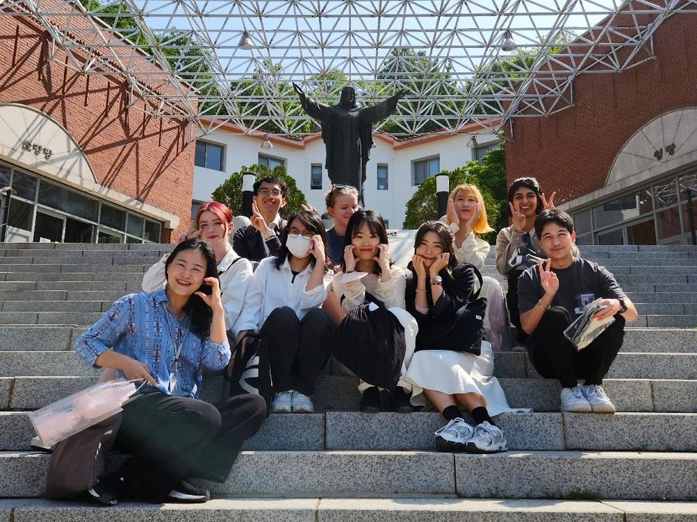 Group of international students at a language school celebrating together.