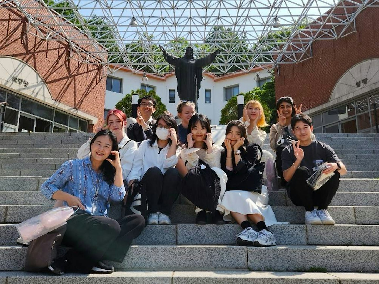 Group of international students at a language school celebrating together.