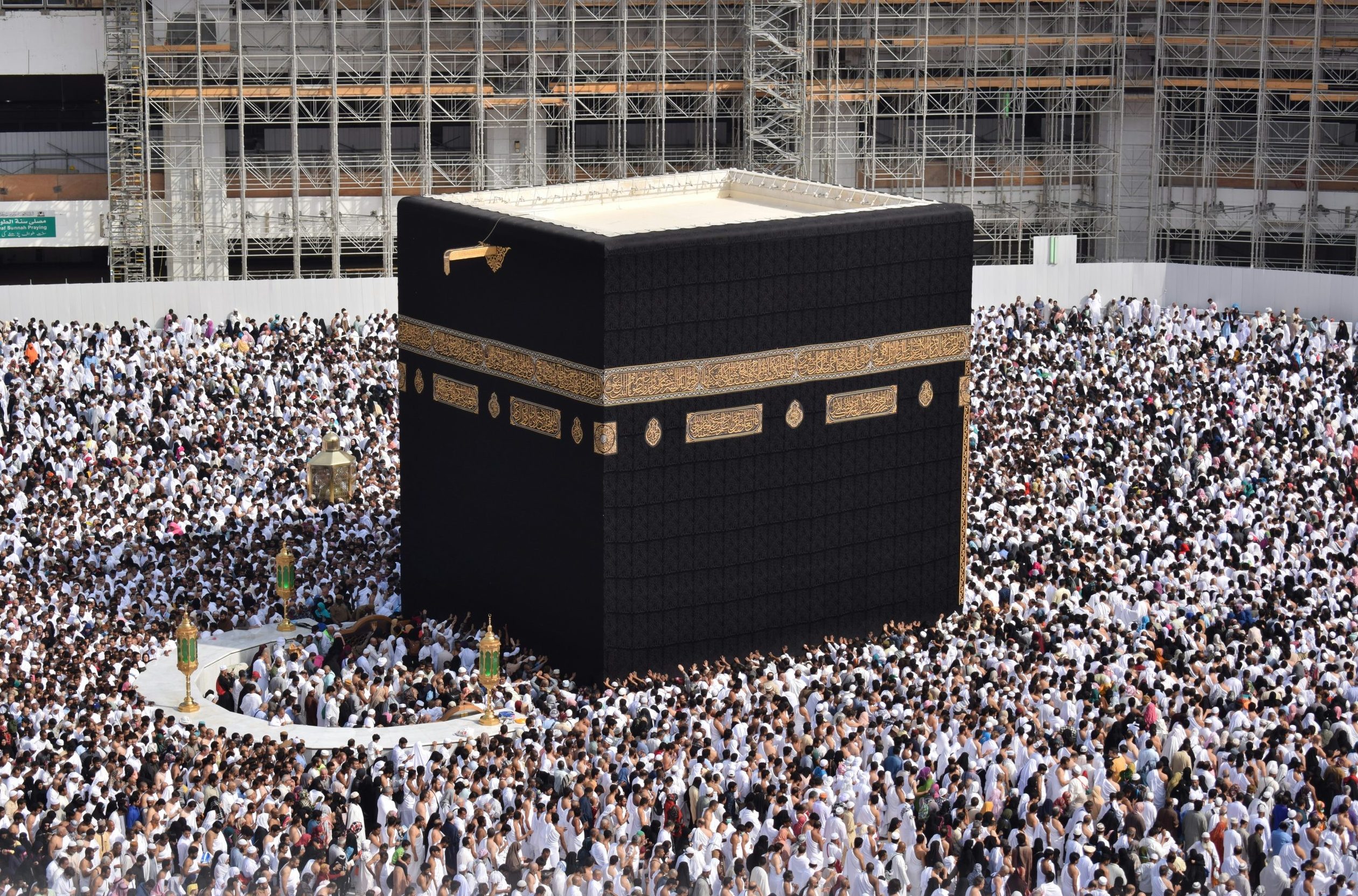 The Kaaba stands in the center of the grand mosque. Many people are gathered around it. Learn more fun facts about Makkah.