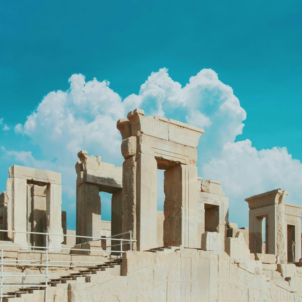The ancient ruins of Persepolis in Iran, showcasing the grand stone columns and intricate carvings of the former capital of the Persian Empire. Fun Facts About Iran