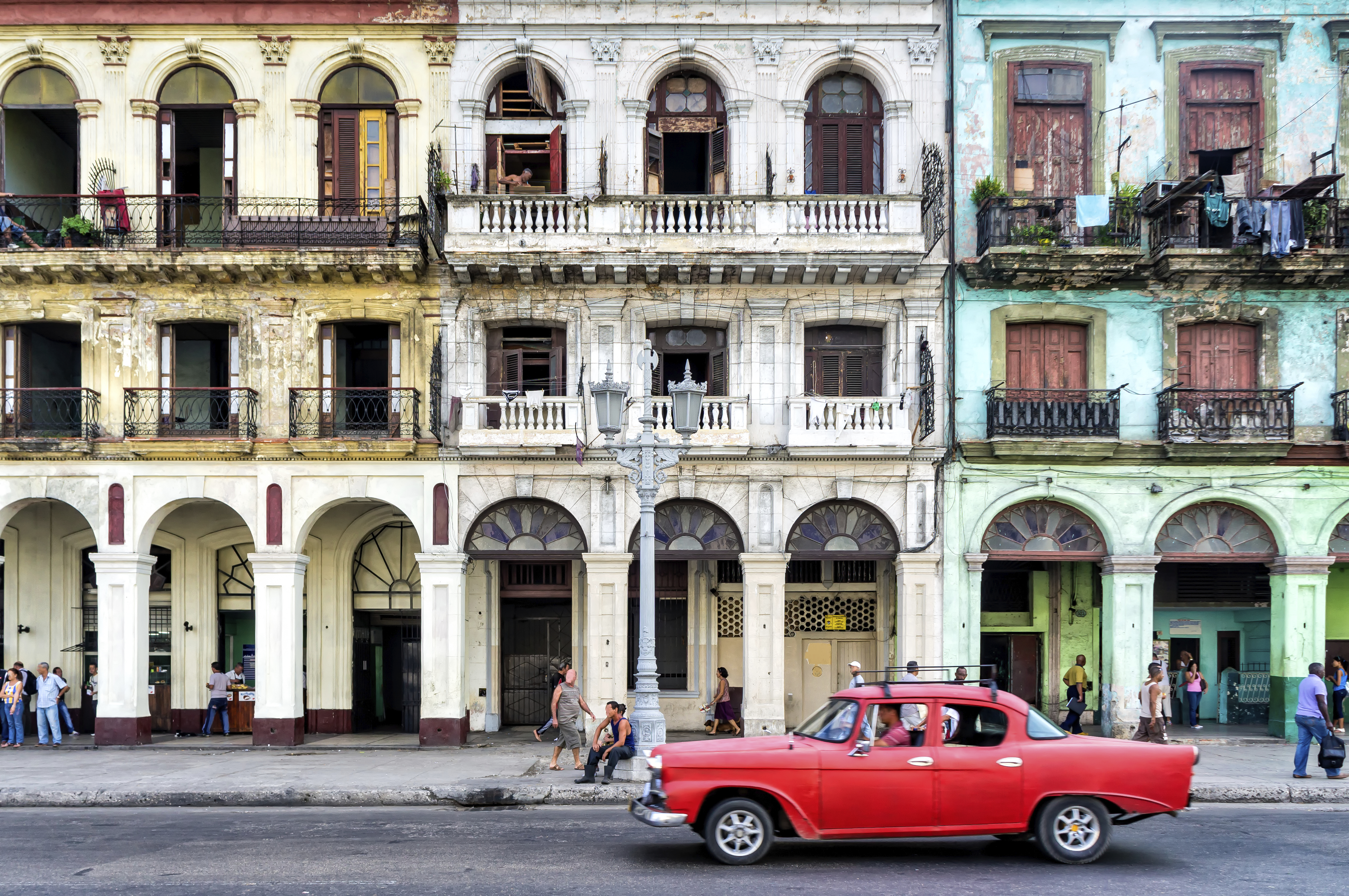 fun facts about cuba red car in front of building