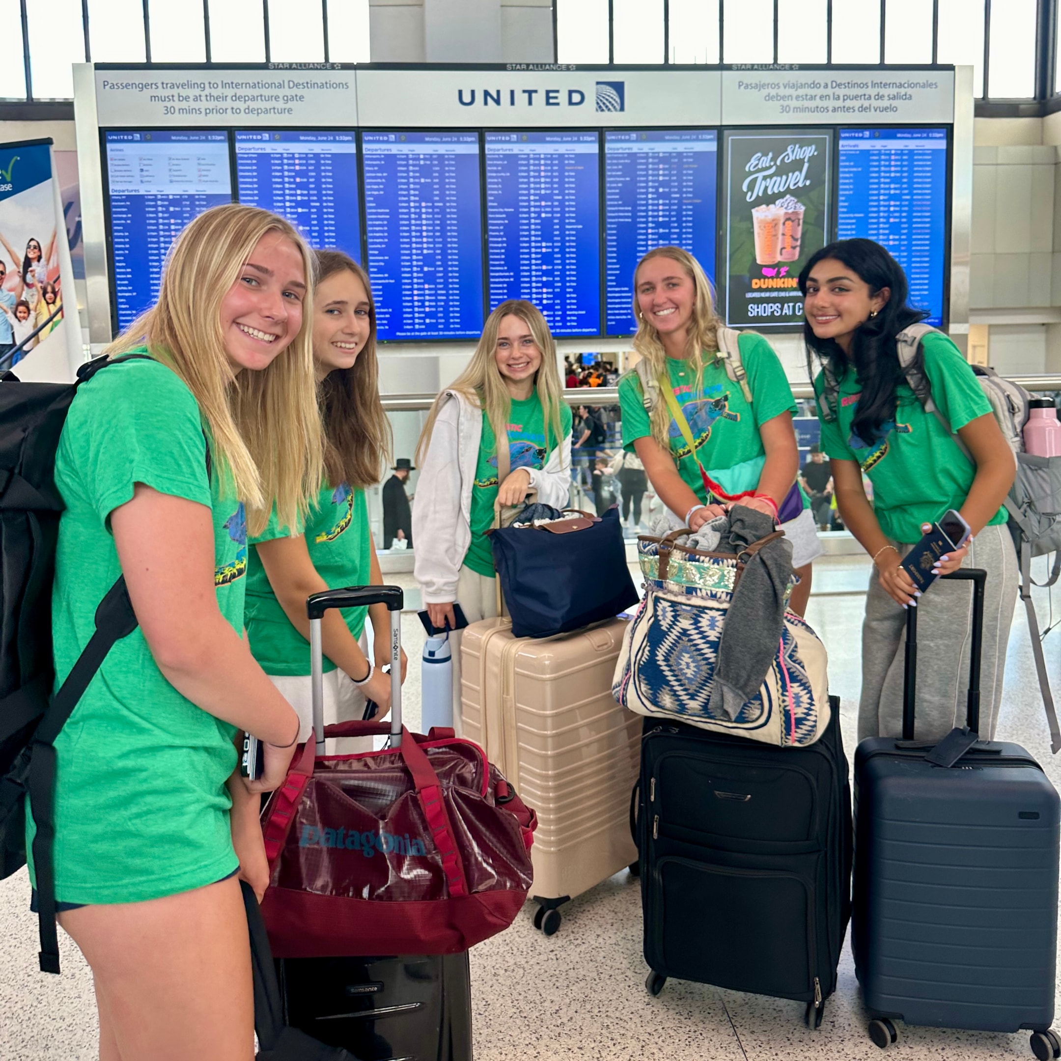 international travel for teens students ready with their suitcases at the airport