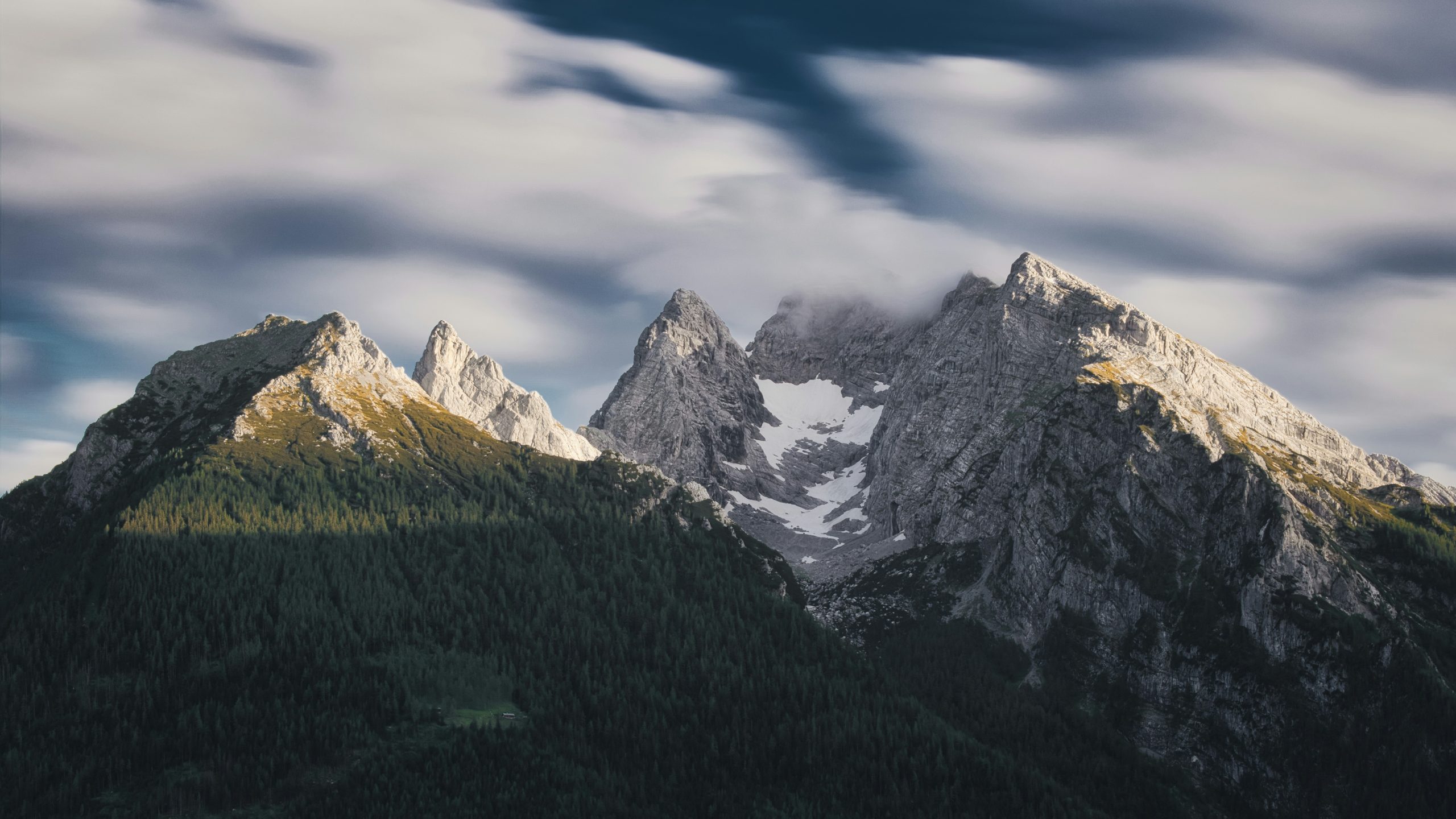 Rugged peaks and forested slopes of the Hochkalter range in Berchtesgaden National Park.
