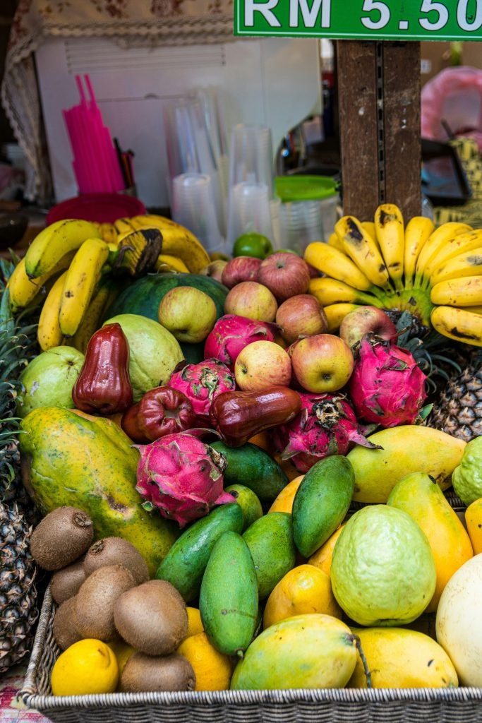 Kuala Lumpur's markets are filled with a variety of fresh fruits, including bananas, kiwis, apples, dragon fruits and mangos.