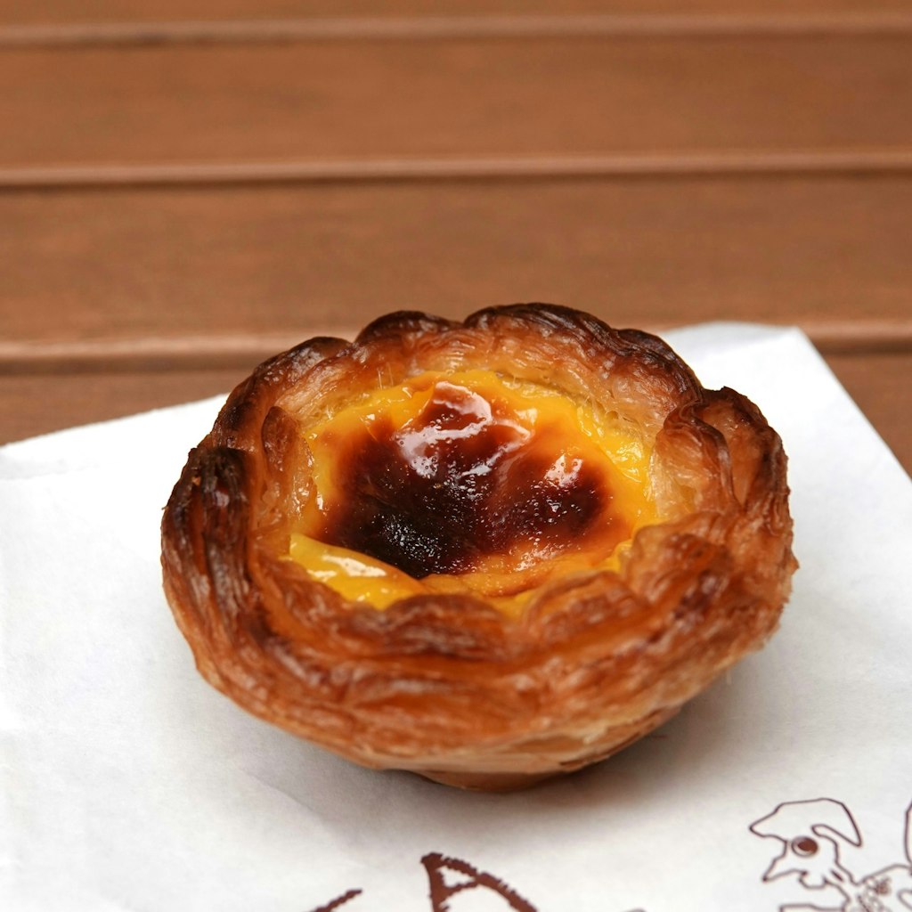 Hong Kong egg tart baked golden-brown.