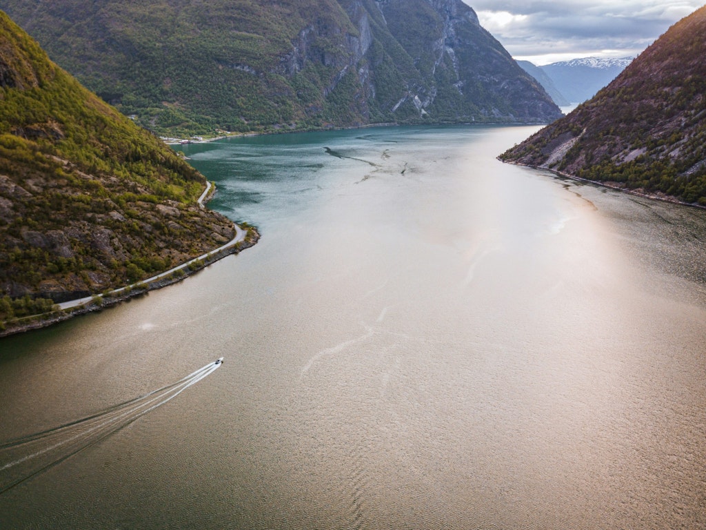 Photo by <a href="https://unsplash.com/@mrtwissel?utm_content=creditCopyText&utm_medium=referral&utm_source=unsplash">Mark Twisselmann</a> on <a href="https://unsplash.com/photos/landscape-photo-of-body-of-water-and-green-mountains-oPT_Pjp1WYk?utm_content=creditCopyText&utm_medium=referral&utm_source=unsplash">Unsplash</a> Sognefjorden is Norway’s longest and deepest fjord