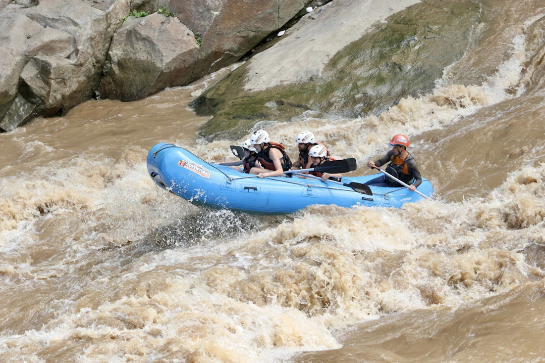 Rustic Pathways students whitewater rafting on an adventure-based program in Thailand