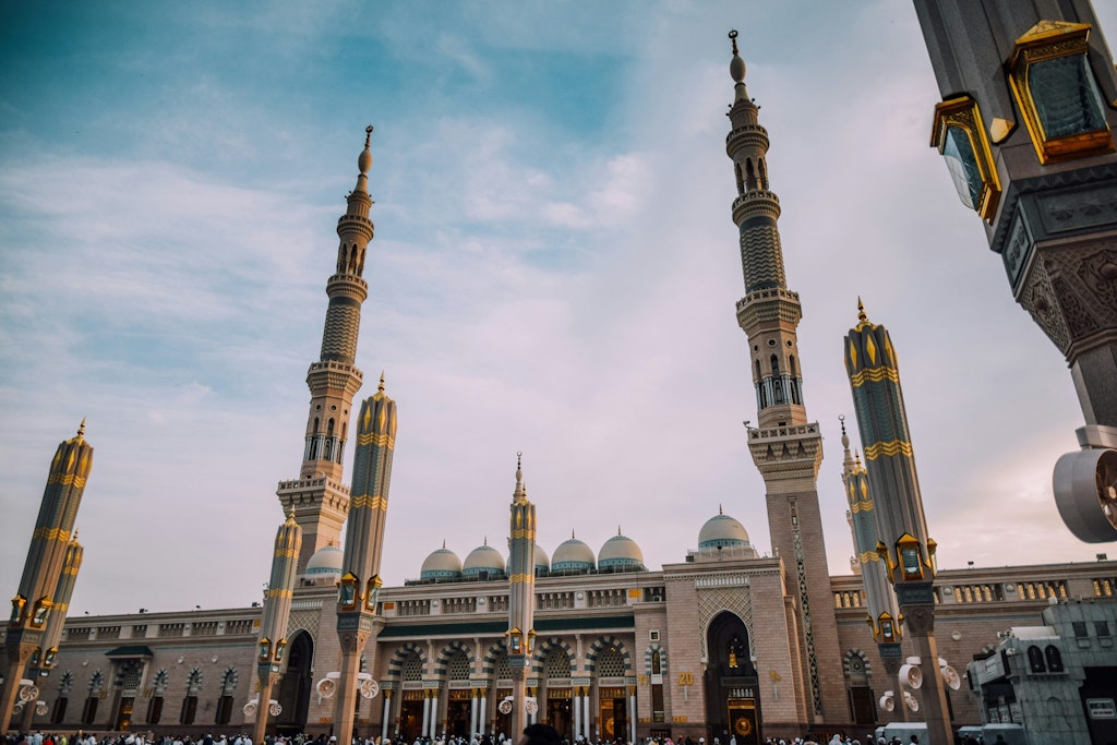 Picture of Medina, Saudi Arabia with blue and cloudy sky and beautiful architecture. Fun Facts About Saudi Arabia