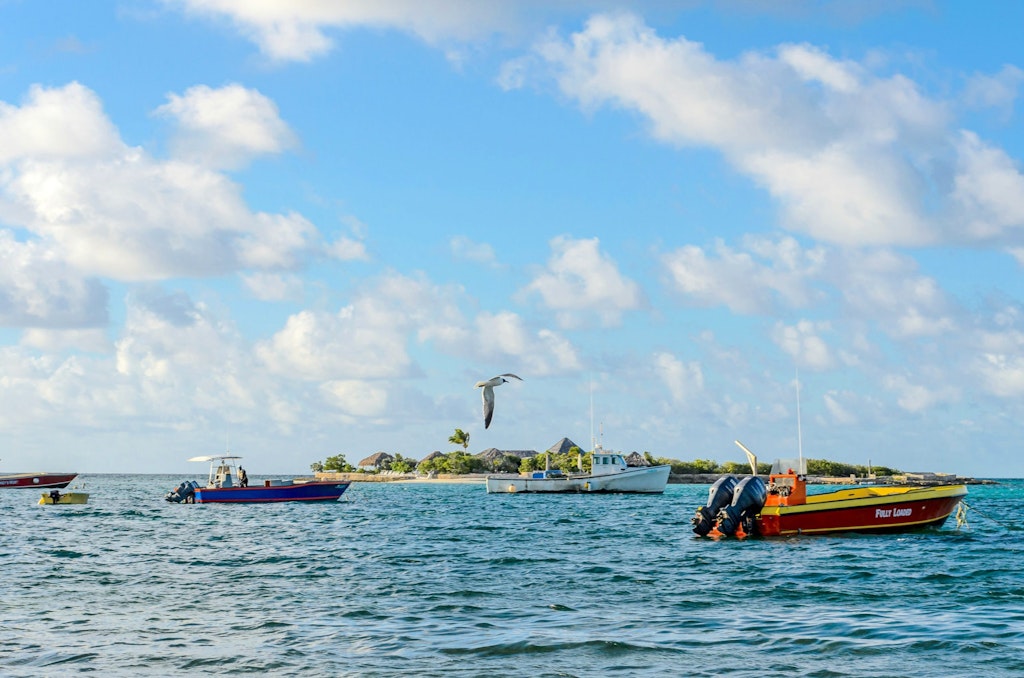 Boats float in the ocean on the waters of Anguilla.