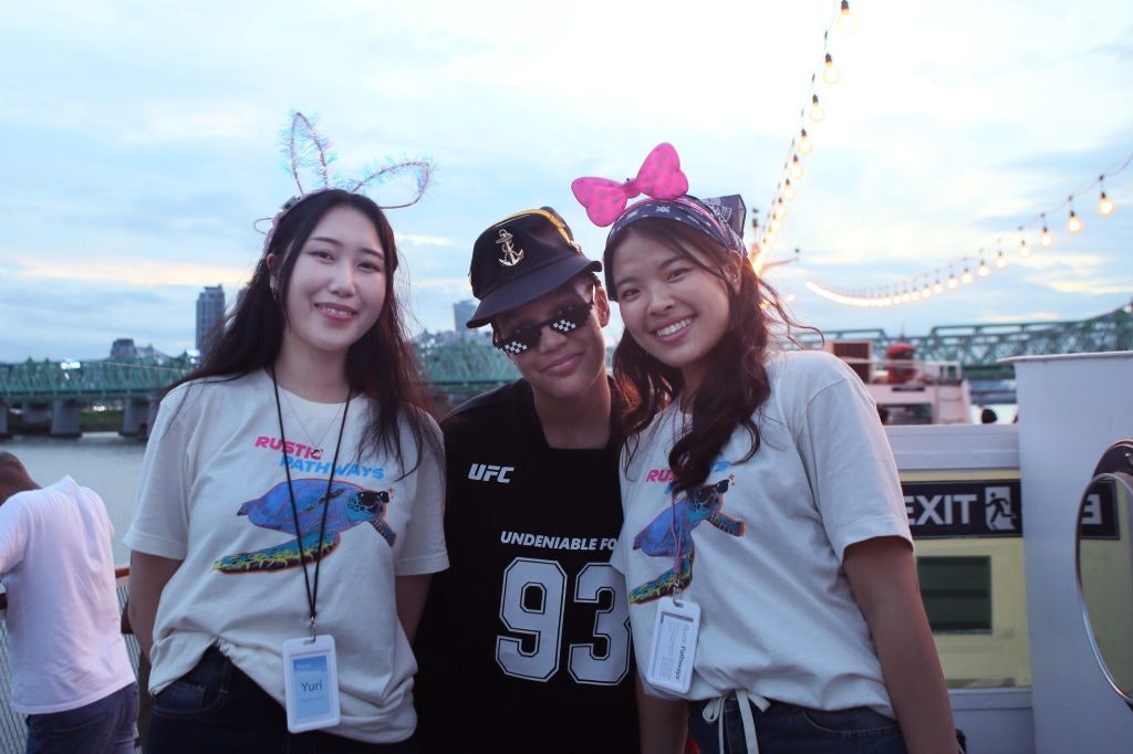 Teen tour program age eligibility and supervision: Student traveler with two Rustic Pathways program leaders in Seoul, South Korea