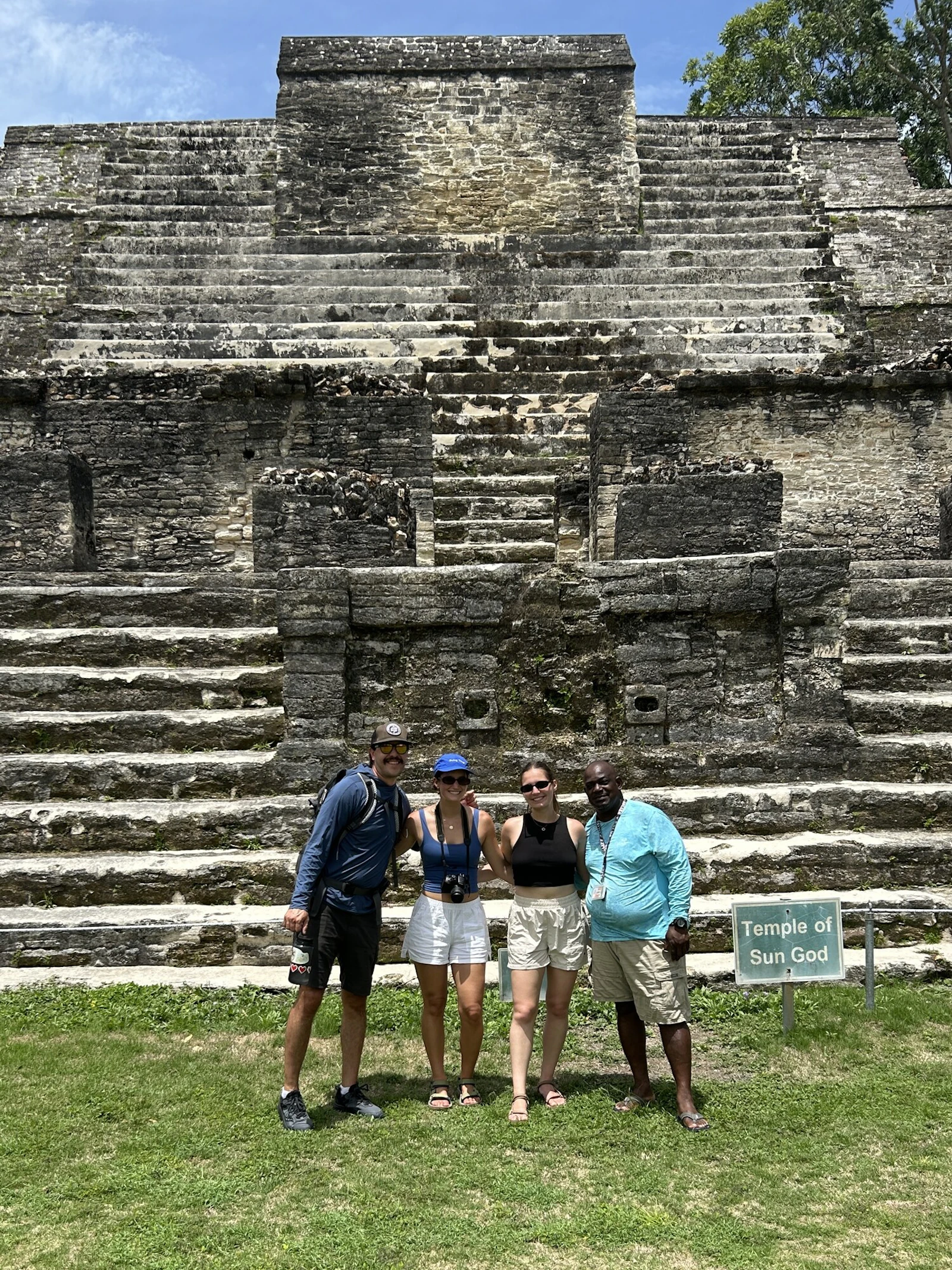 Rustic Pathways Program Leaders for Belize stand in front of a Maya temple